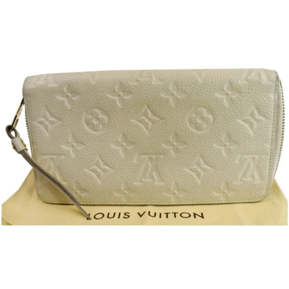 Louis Vuitton Secret Long Wallet – Monogram Empreinte Ivory Leather Authentic
